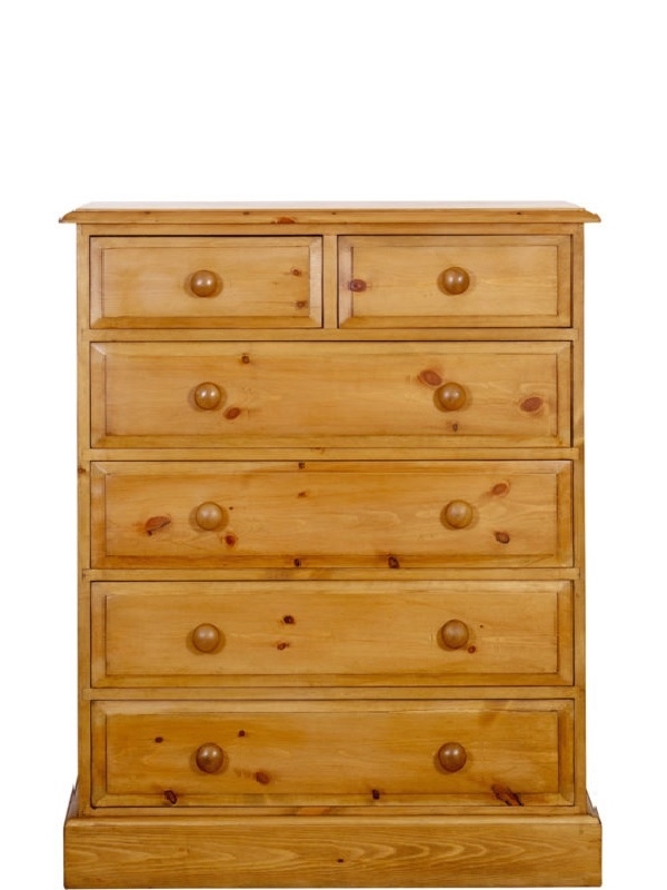 a 2 over 4 pine chest of drawers which is 36 inches long
