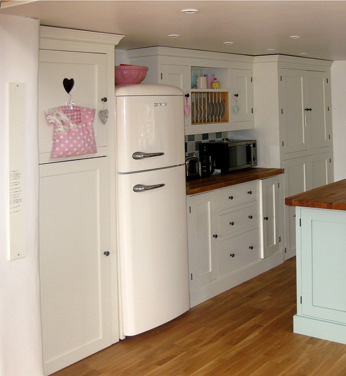 a painted pine kitchen with heart cut out