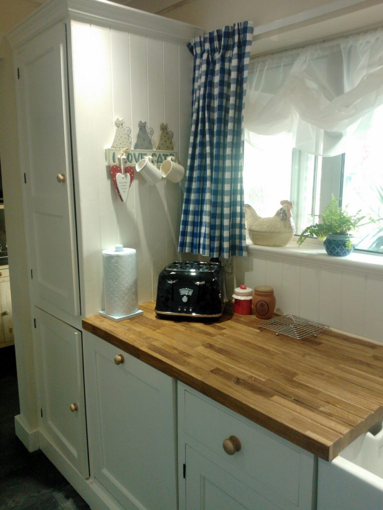 a made to measure boiler cupboard in a kitchen