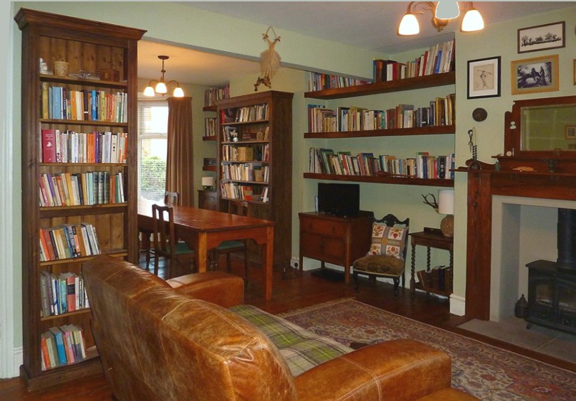 Two pine bookcases and shelves 