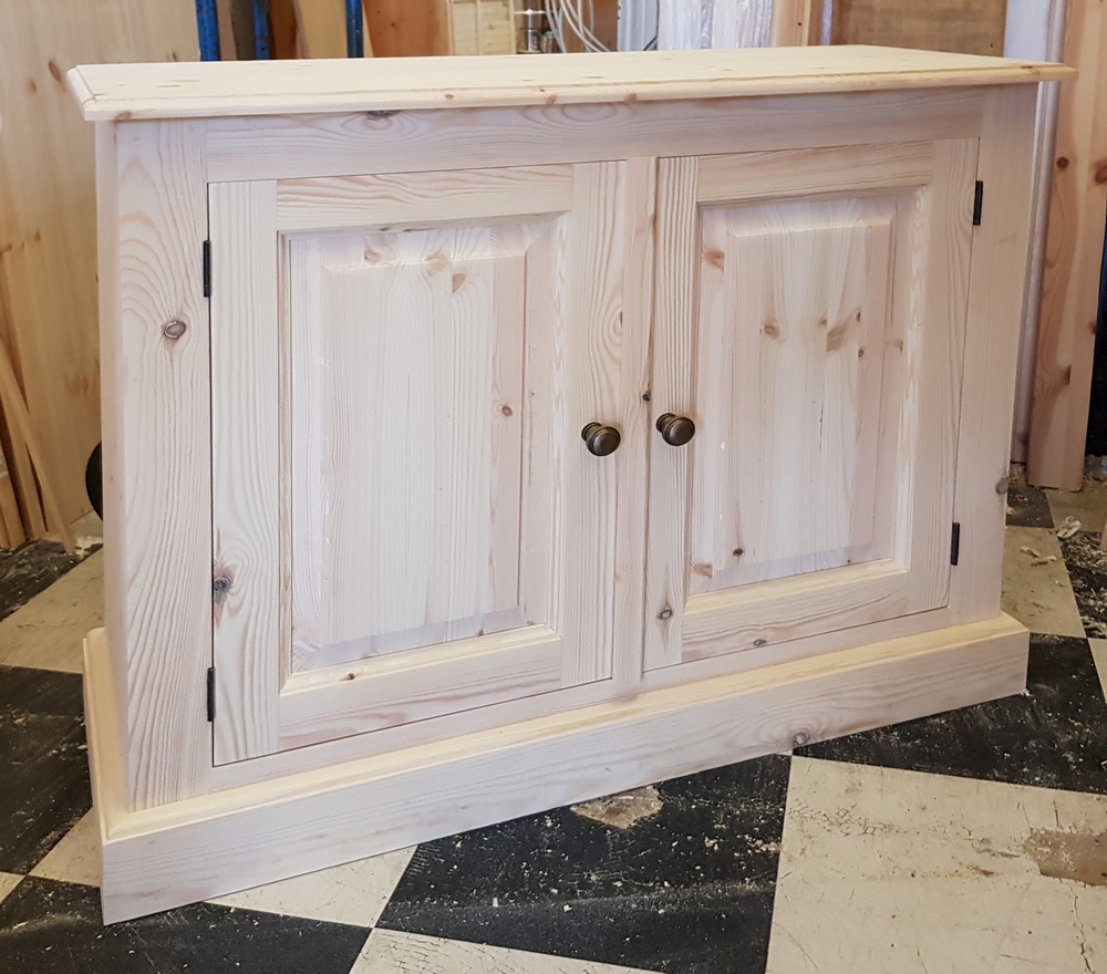 A pine cupboard made by Pegasus pine, Northampton.